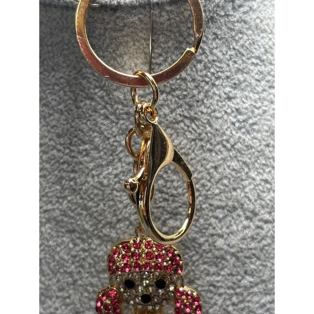 #16. Sparkly Pink Dog Rhinestone Keychain Bag Charm